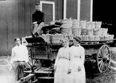 Black and white photo of orchard owners